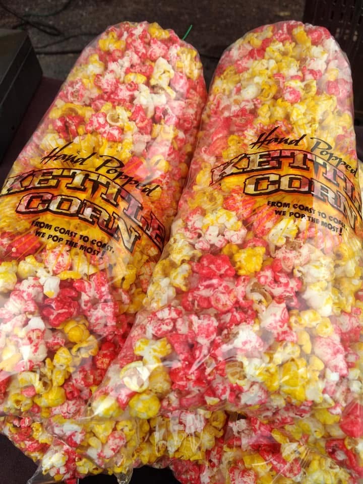 Close-up of colorful sweet kettle corn in clear bags.